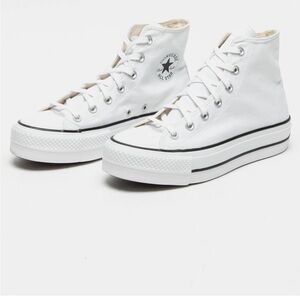 Converse high top platform size 8.5 
Worn 2 times 
Excellent condition